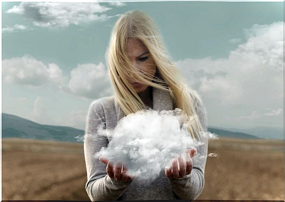 Woman with cloud in hands