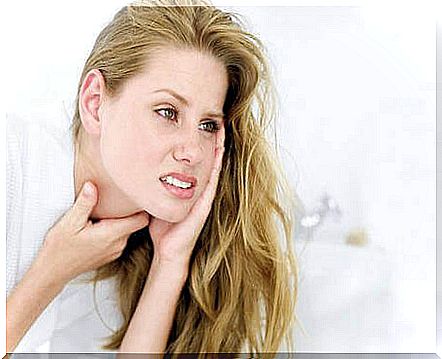 Woman with sore throat