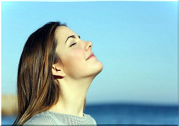 Woman enjoying being by the water