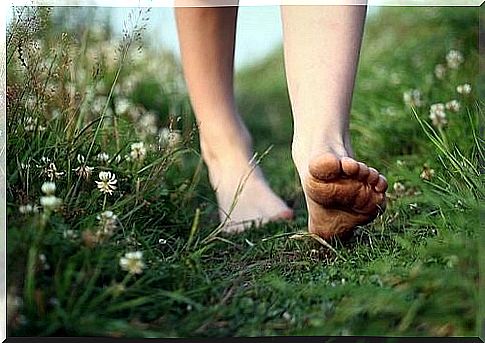 Woman walking on bare feet