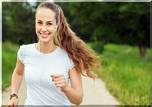 Smiling woman running outside