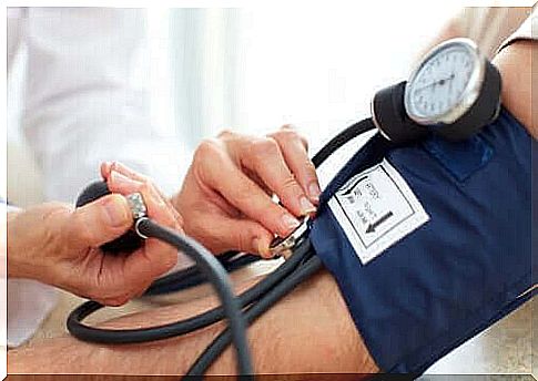 Person gets blood pressure measured before treatment with corticosteroids