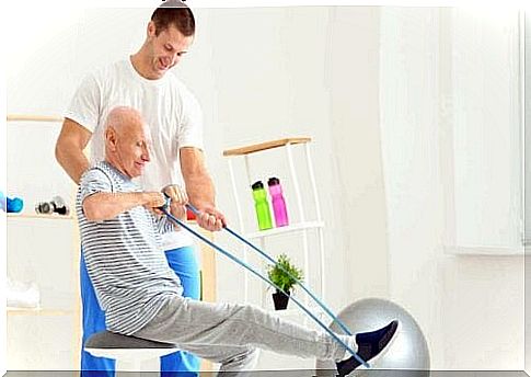 Older man doing exercises with elastic