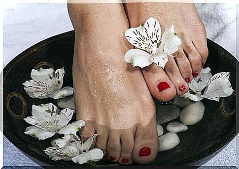 Woman taking foot bath