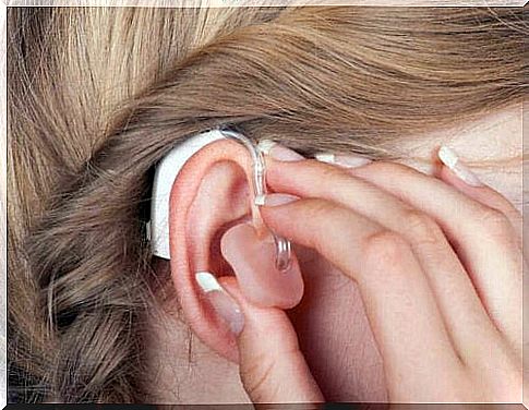 Woman with hearing aid