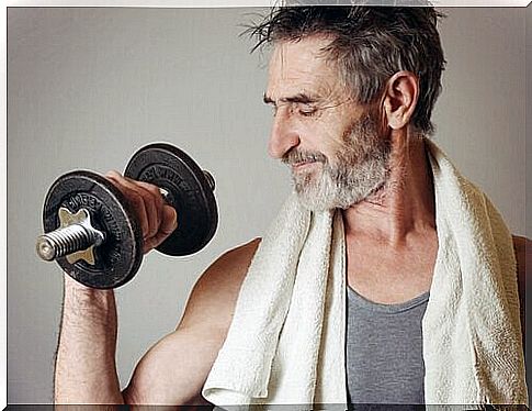 Man with beard lifting a weight