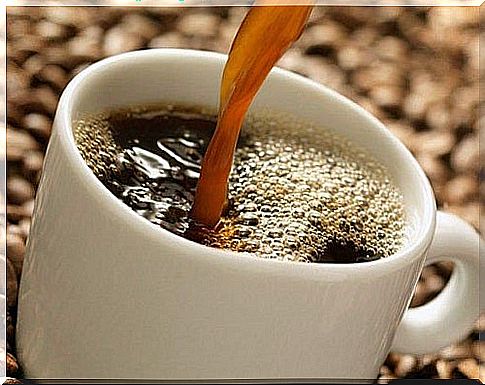 Cup of coffee being poured