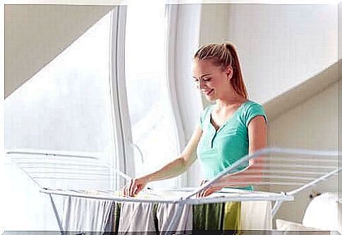 A woman hanging her clothes to dry