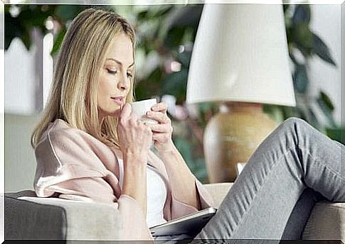 Woman sitting and drinking tea