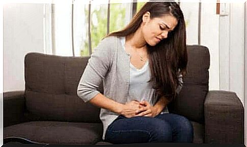 Woman with stomach ache needs remedies with fennel seeds