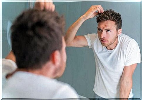 A man looking in the mirror