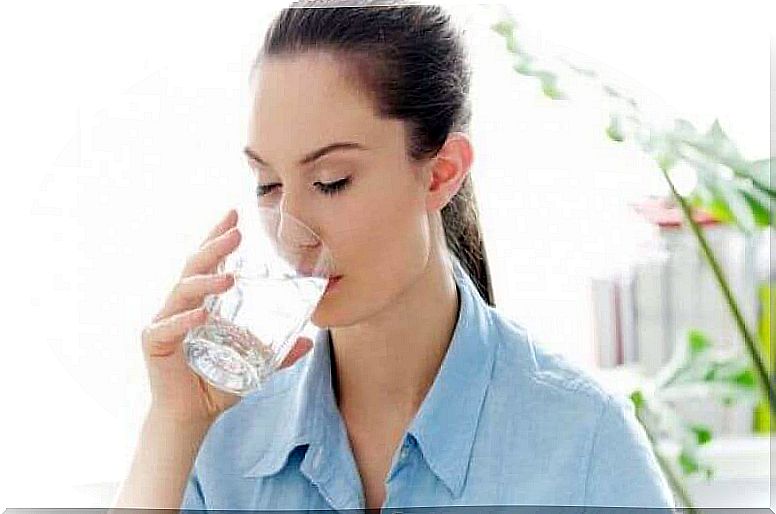 Woman drinking a glass of water