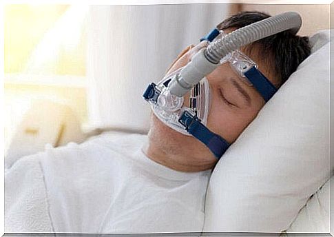 A man with respiratory protection while sleeping