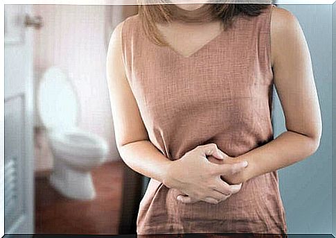 Woman with stomach pain due to pathogens in summer