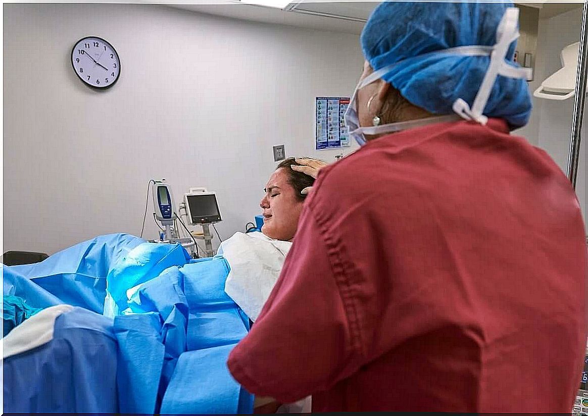 A woman undergoes vaginal birth after cesarean section