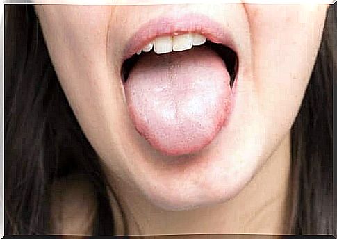 Woman with tongue out of mouth