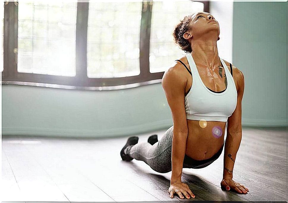 Woman practicing yoga for strong muscles