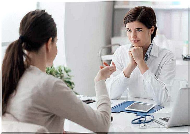 A doctor talking to a patient about lupus